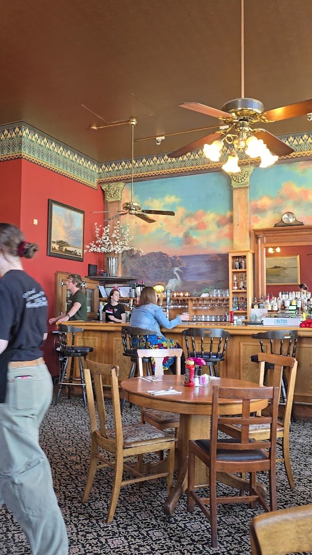 Small dining room with seafood and draft beer.